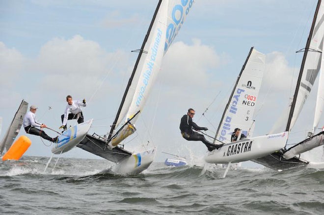 Beattie/Leitner battling with Geijssen/Van Asselt - Nacra Infusion Worlds 2011 © Bootinbeeld.nl